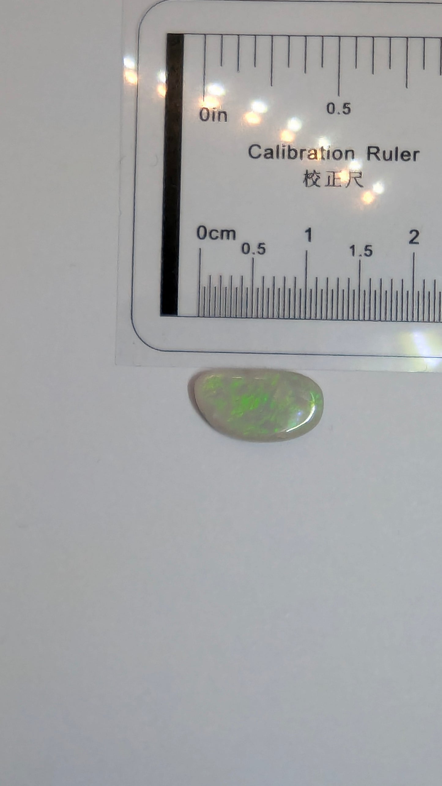 Opal + freeform with green & yellow tones visible
