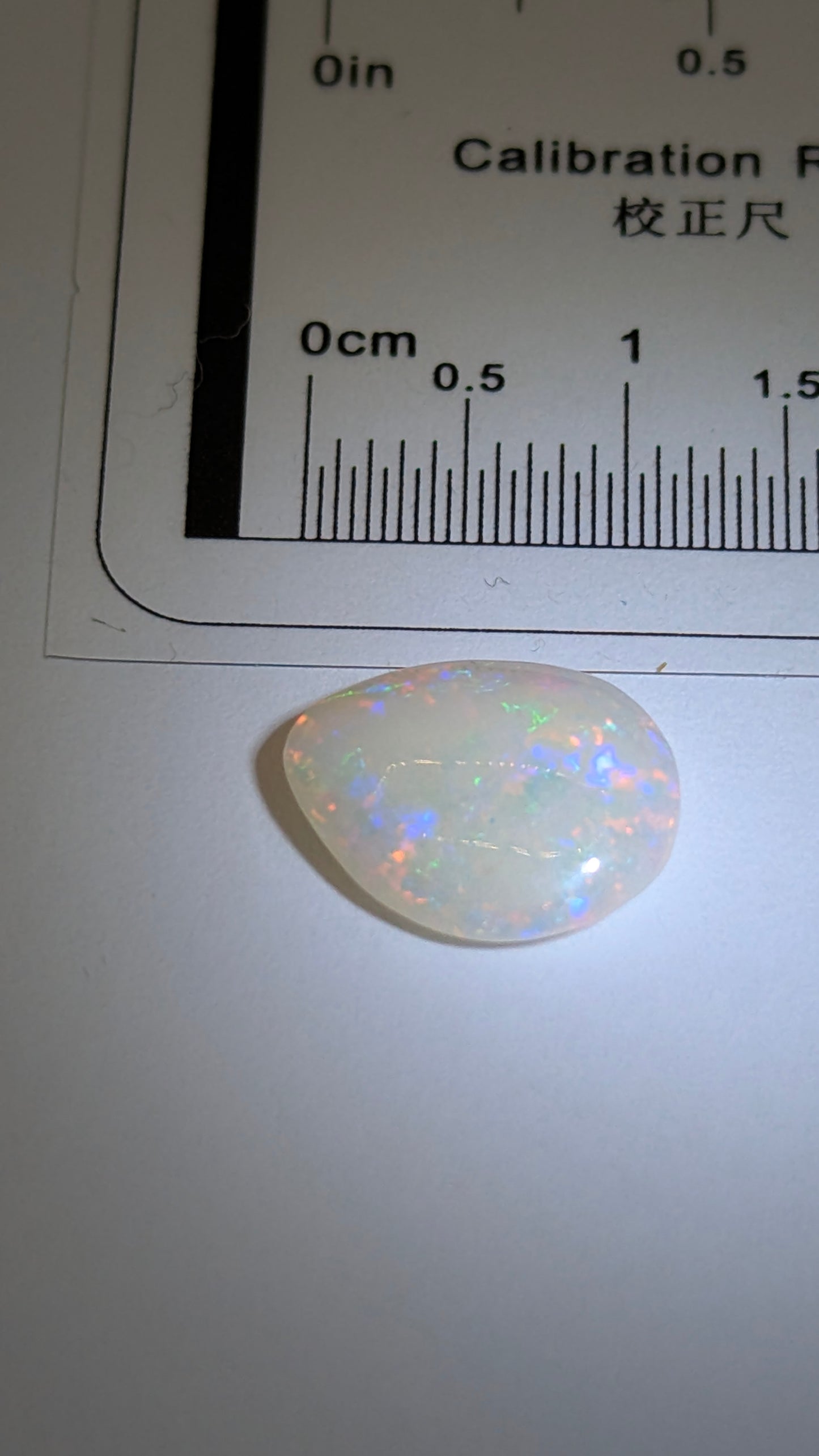 Opal- white teardrop shaped