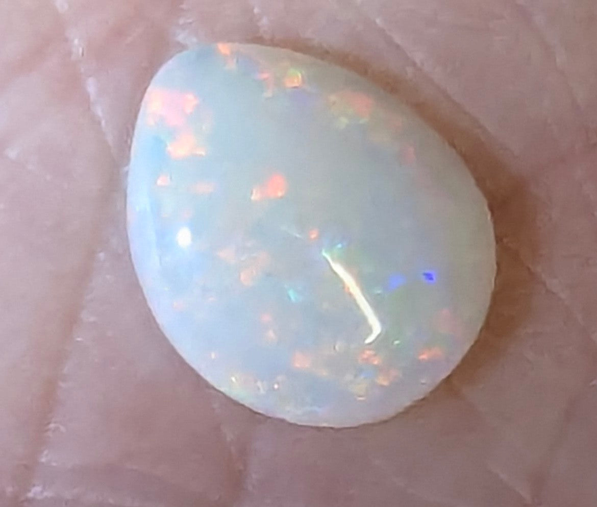 Opal- white teardrop shaped