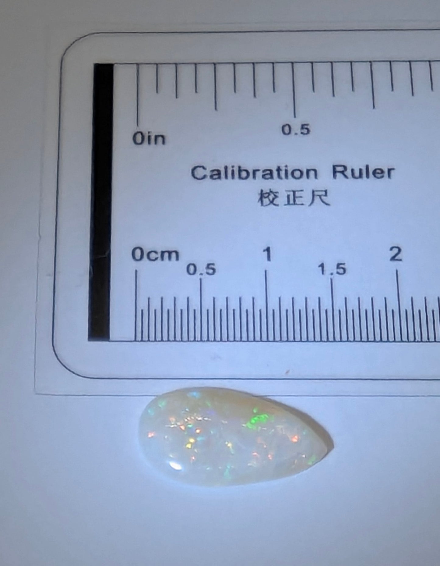 Opal - white freeform teardrop